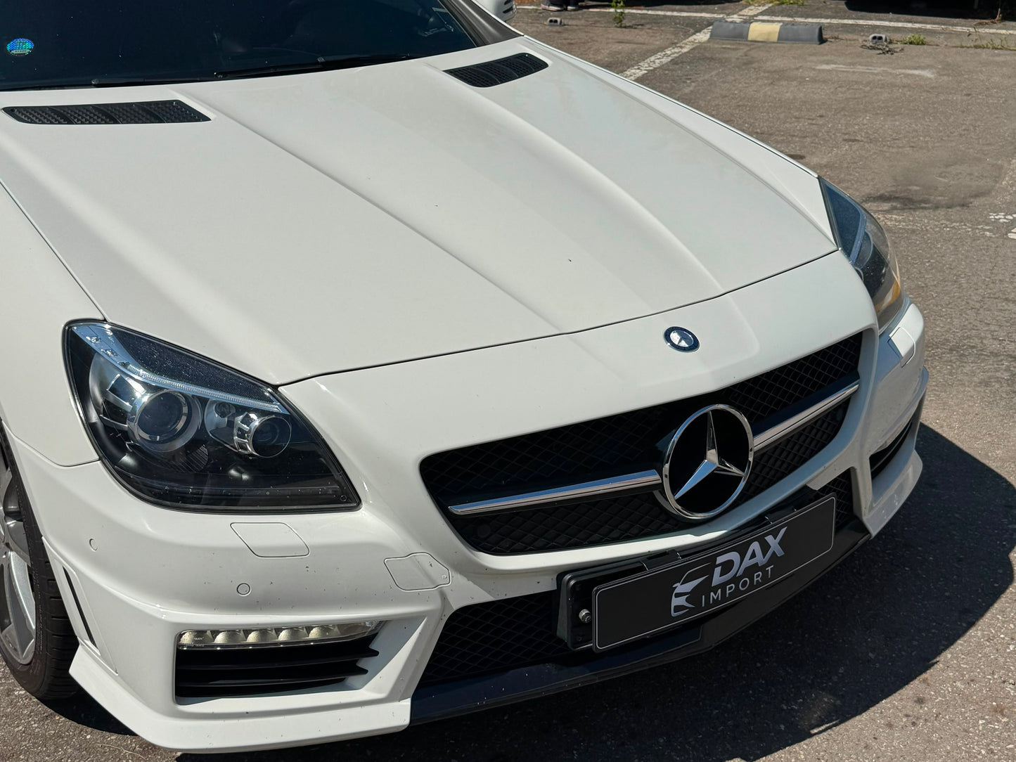 Mercedes-Benz SLK 55 AMG (R172) | 65.989 km | Calcitweiß | AMG SPEEDSHIFT PLUS 7G-TRONIC | Roadster | Südkorea
